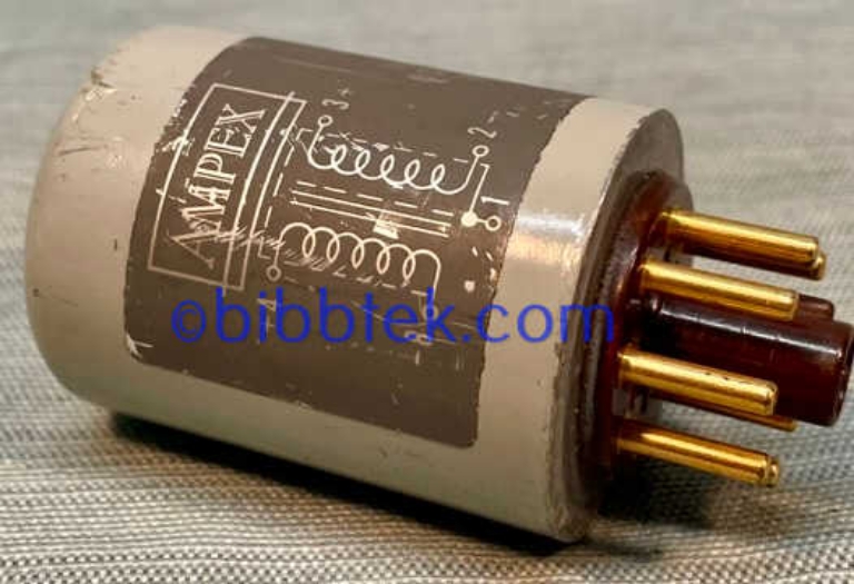 Picture of Ampex 4580116-20 Octal plug in Transformer, grey case with gold pins.